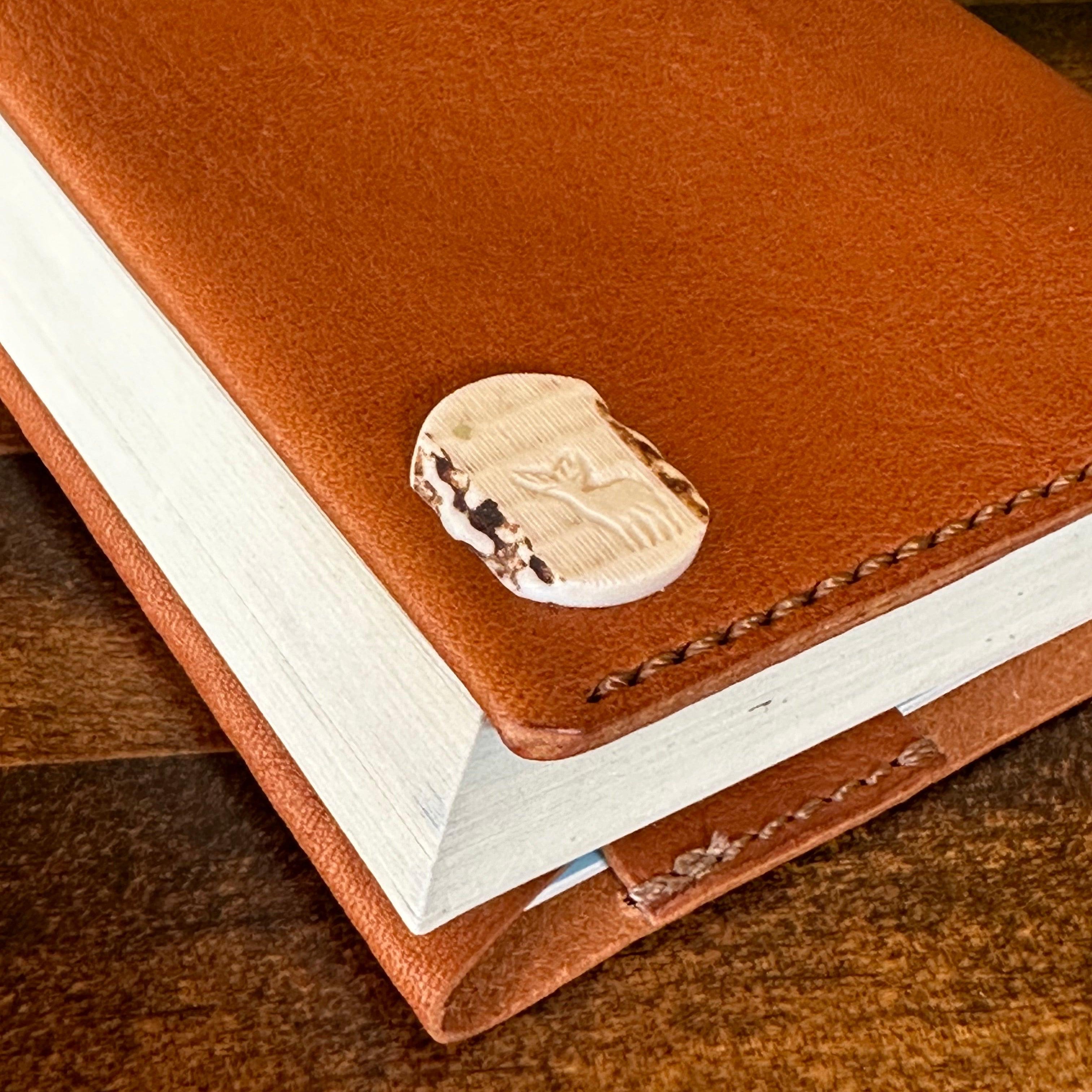 Paperback book cover, brown (Tochigi leather, Yaku deer horn, luminous shell buttons)