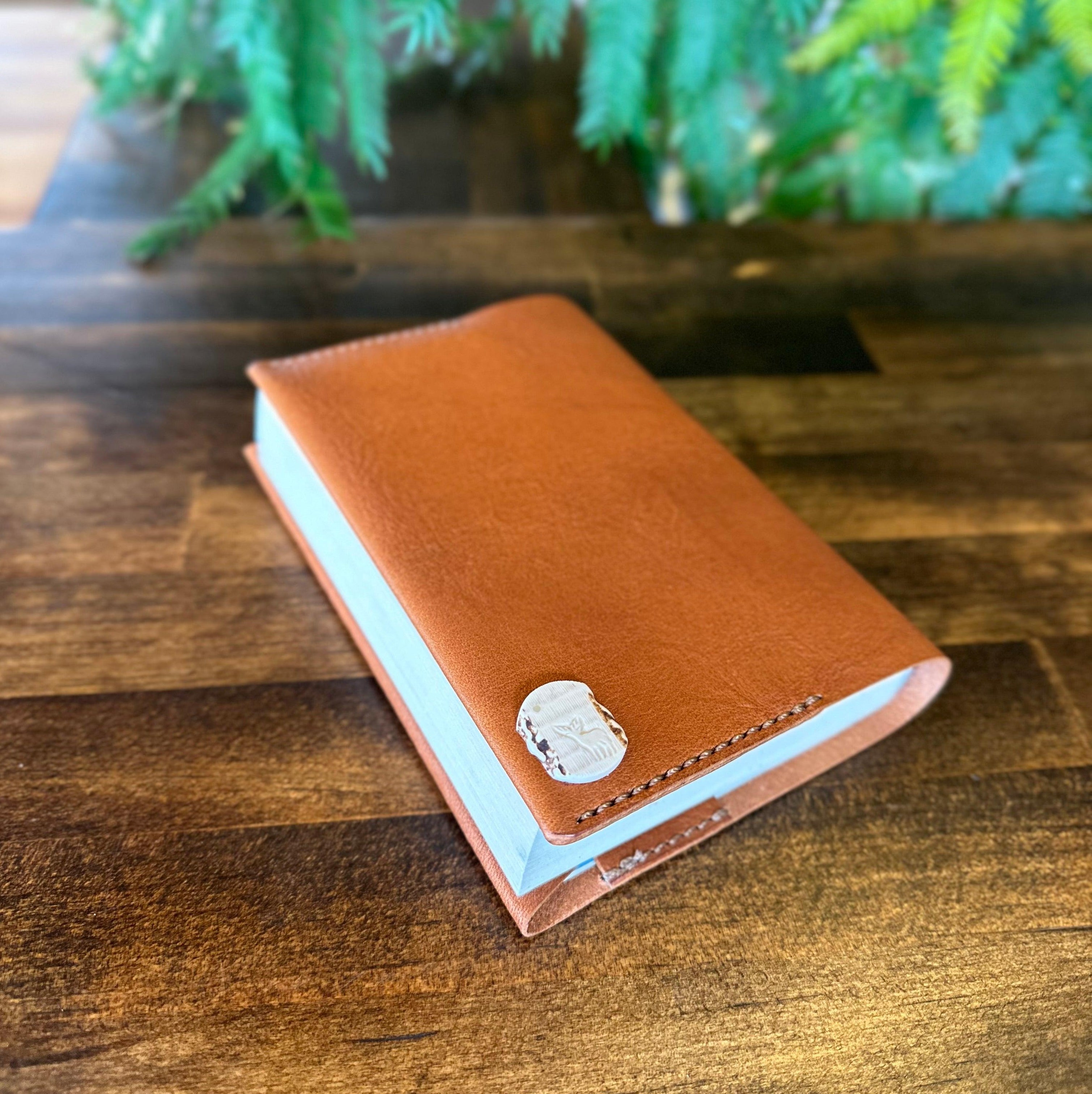 Paperback book cover, brown (Tochigi leather, Yaku deer horn, luminous shell buttons)
