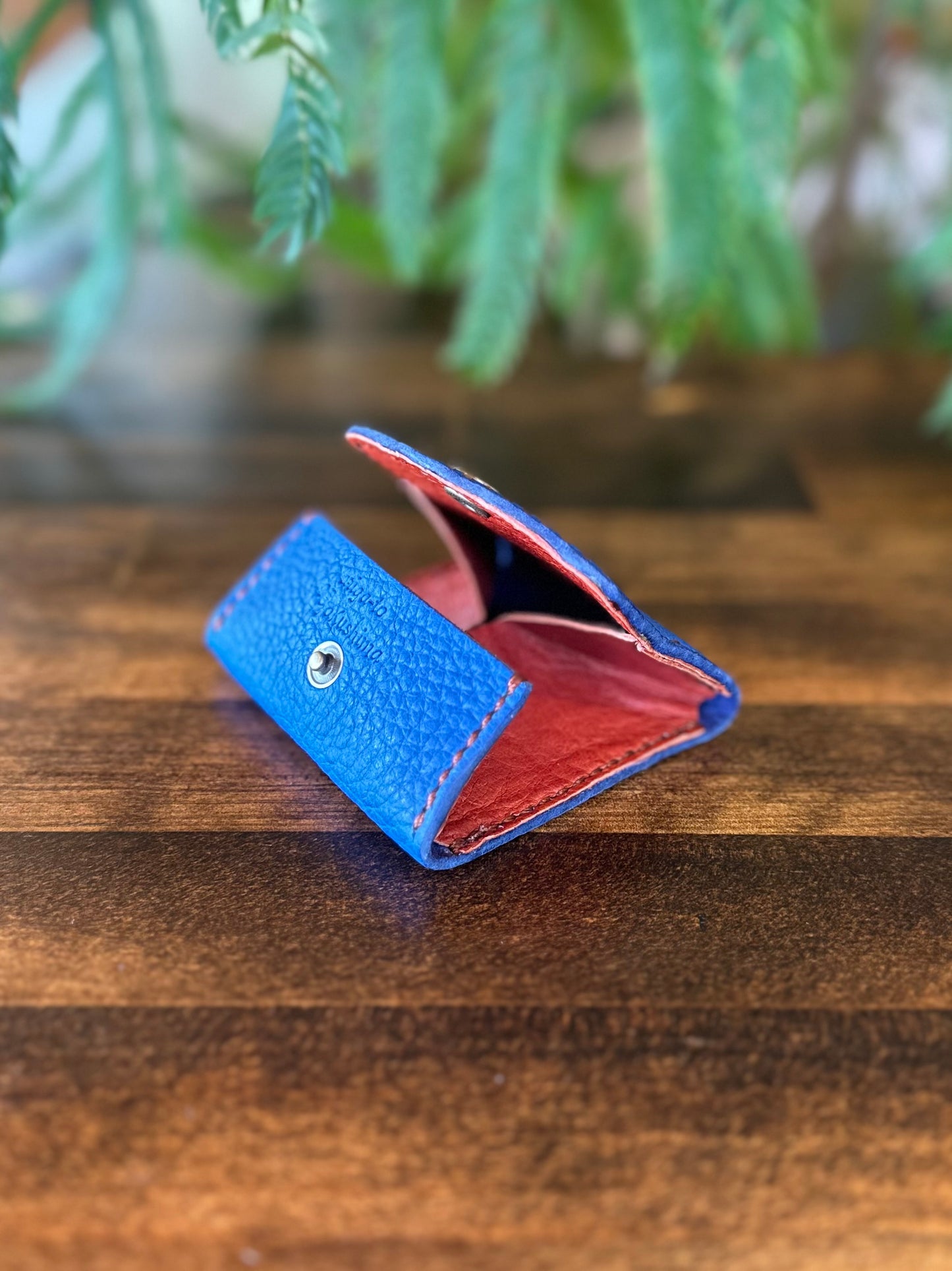 Box-shaped coin case (blue x camel)