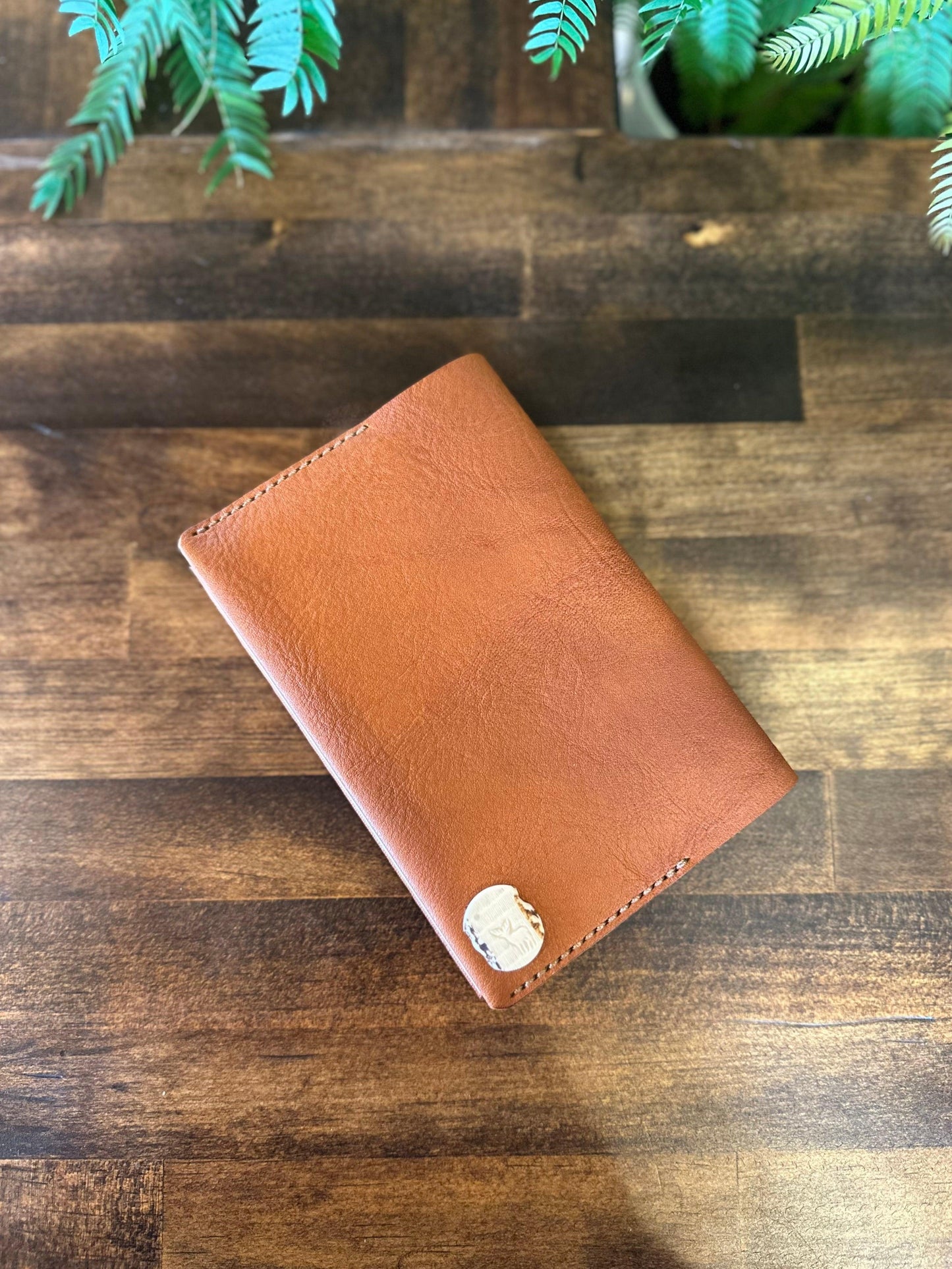 Paperback book cover, brown (Tochigi leather, Yaku deer horn, luminous shell buttons)