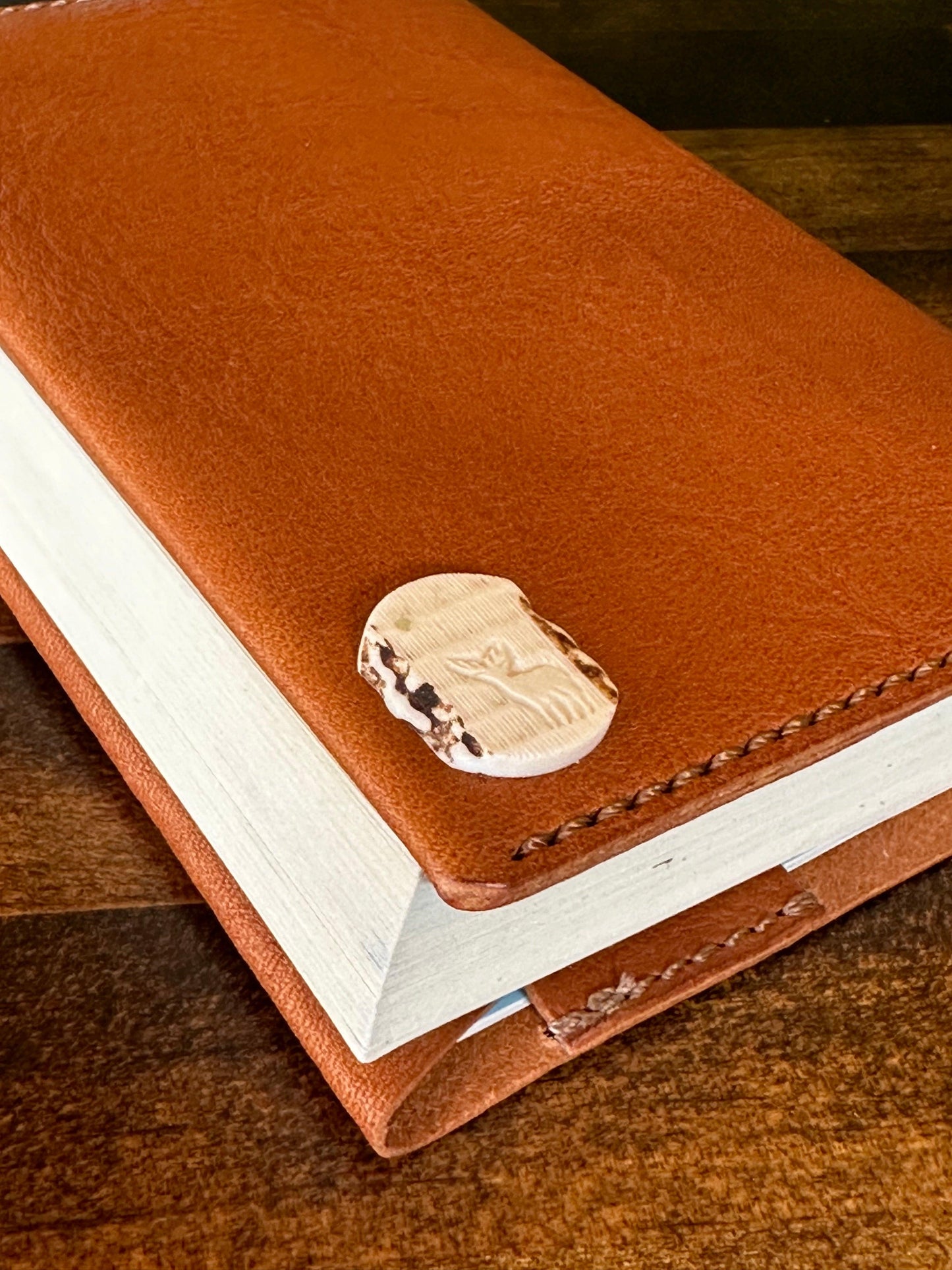 Paperback book cover, brown (Tochigi leather, Yaku deer horn, luminous shell buttons)