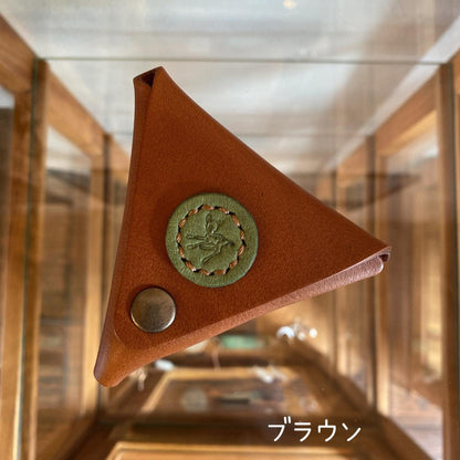 Triangular coin case with Cow